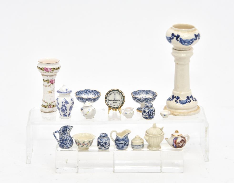 Whitworth, Tag, English RM Porcelain Miniatures: Shirley Whitworth jardiniere on stand 2 3/8"H, teapot, creamer and sugar bowl and blue & white jar with lid 1.5"H, T.H. jardiniere on stand 4"H, Jean tag blue & White sponge decorated pitcher, two Chi