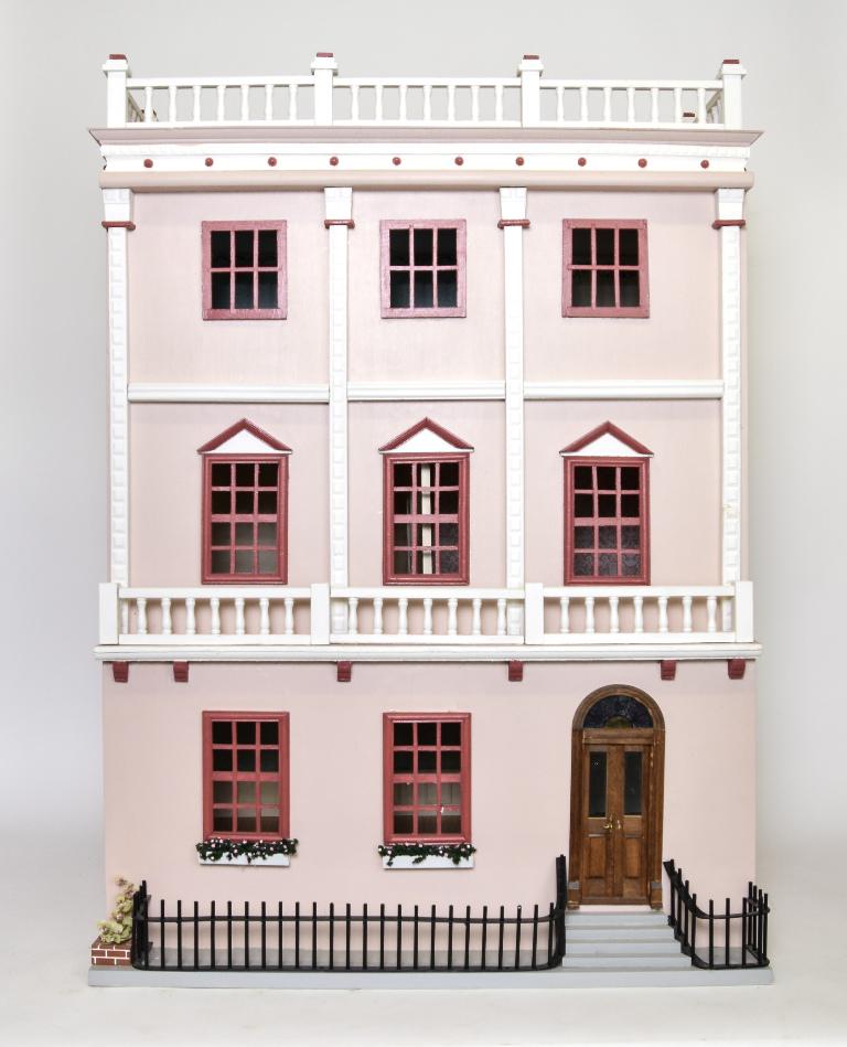 Georgian Townhouse Dollhouse: Large well made wood dollhouse, painted exterior has a bal lustrated flat roof, eight wood window frames, two window boxes, second floor exterior railing, opening double front door with fan light flan