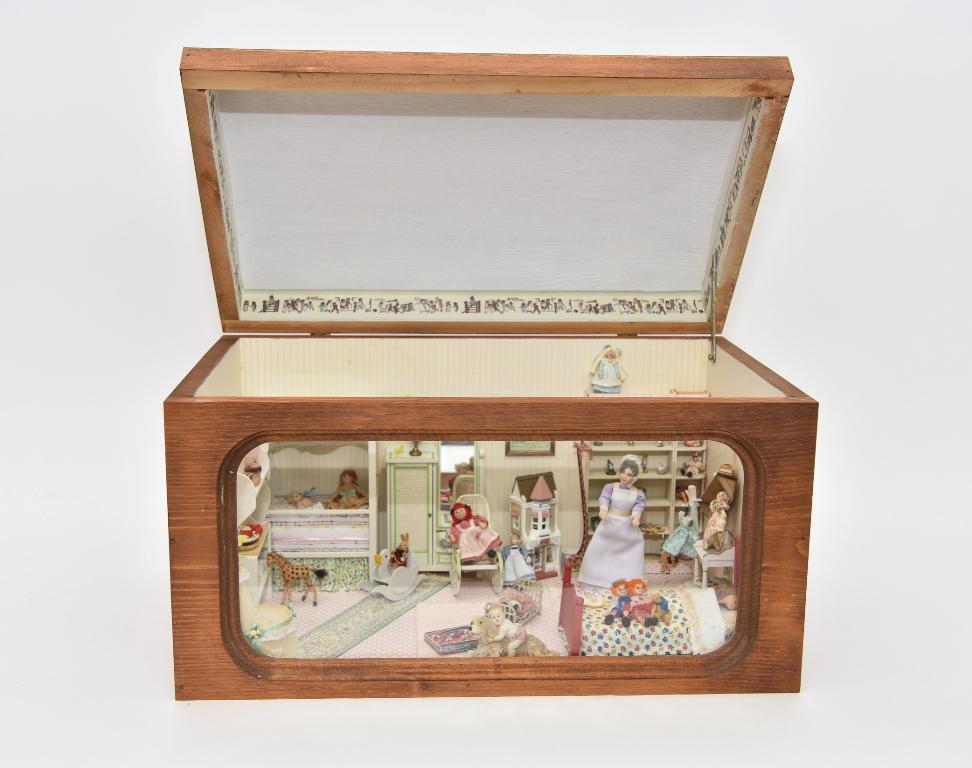 Furnished Girl Lovely Room Box: Wooden trunk form room box with removable glass front and hinged dome top for access, painted ceiling with papered walls and floor, interior has a nice assortment of furniture with a tester bed with a