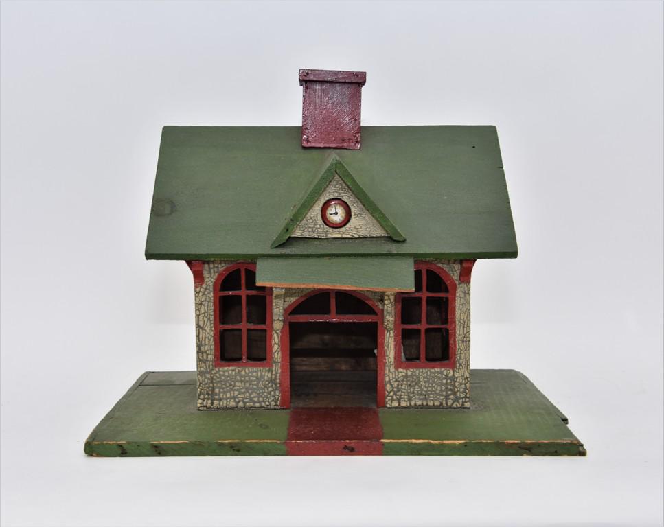 Antique Folksy Train Station Dollhouse: Folksy train station circa 1900 to 1940 made from hand painted parts of wood crates, great original finish, 19.75"W, 14"D, 15.5"H