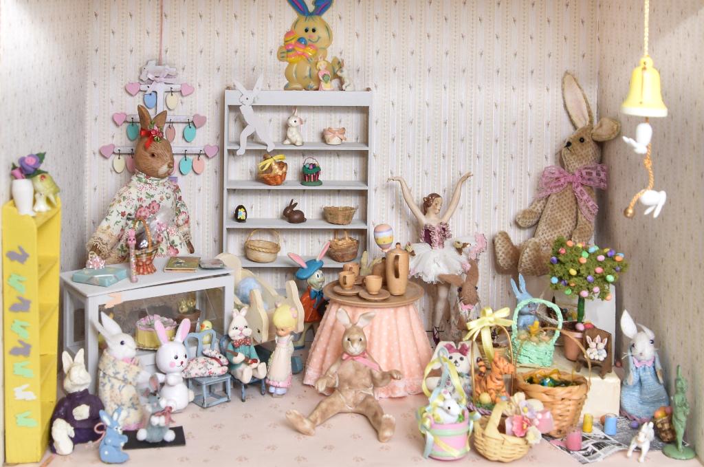 Furnished Easter Bunny Room Box Dollhouse: Small wood room box has a painted ceiling and paper covered walls and floor, includes a nice whimsical selection of Easter and rabbit miniatures, cast resin rabbit in a lace trimmed dress 6.5"H, store