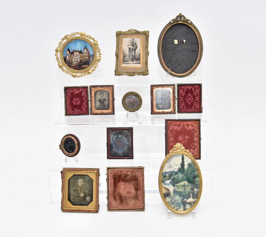 Antique Small Photos And Ormolu Frames: Original 1840's to 1850's Daguerreotype photo of a young gentleman in a split hinged ormolu mounted case 3.25" by 3.75", faded Daguerreotype photo of a woman in a half case lacking brass mount 2 3/8" 