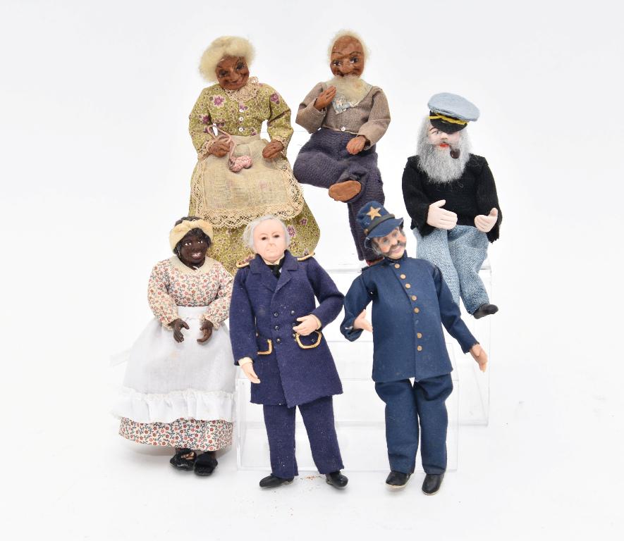 Six Artisan Dollhouse Doll Miniatures: Six unsigned artisan clay dolls, cook wearing fuzzy bedroom slippers 5.75"H, seated ship's captain, policeman with damaged fingers 6"H and a military officer 6"H, grizzled old seated couple