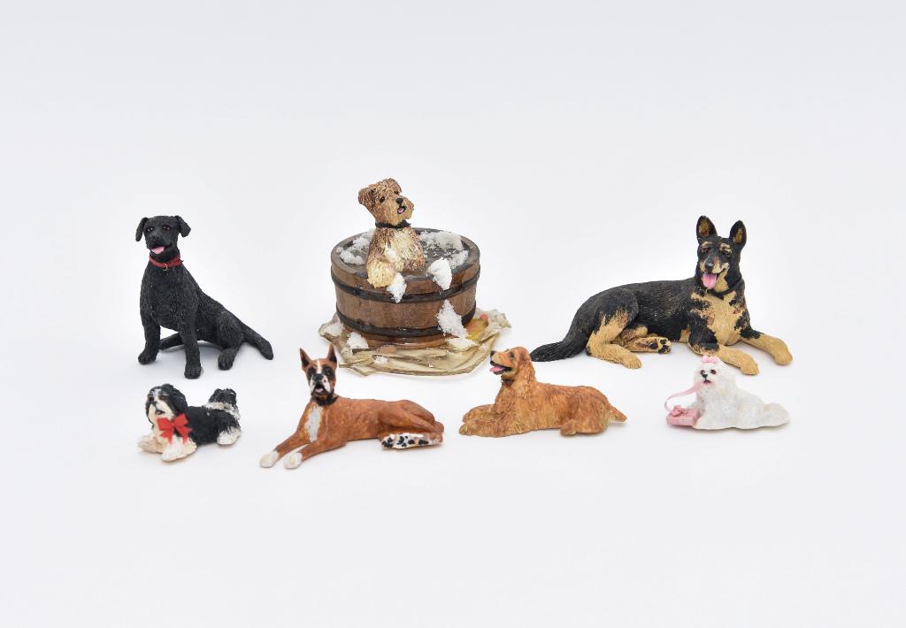 Seven Gail Morey Artisan Dollhouse Animals: Group of six Gail Morey Dollhouse Miniature dogs made from artisan clay, German Shepherd 4"L, Morey dog taking a soapy bath in a wood tub with water spilling out 3.5"W