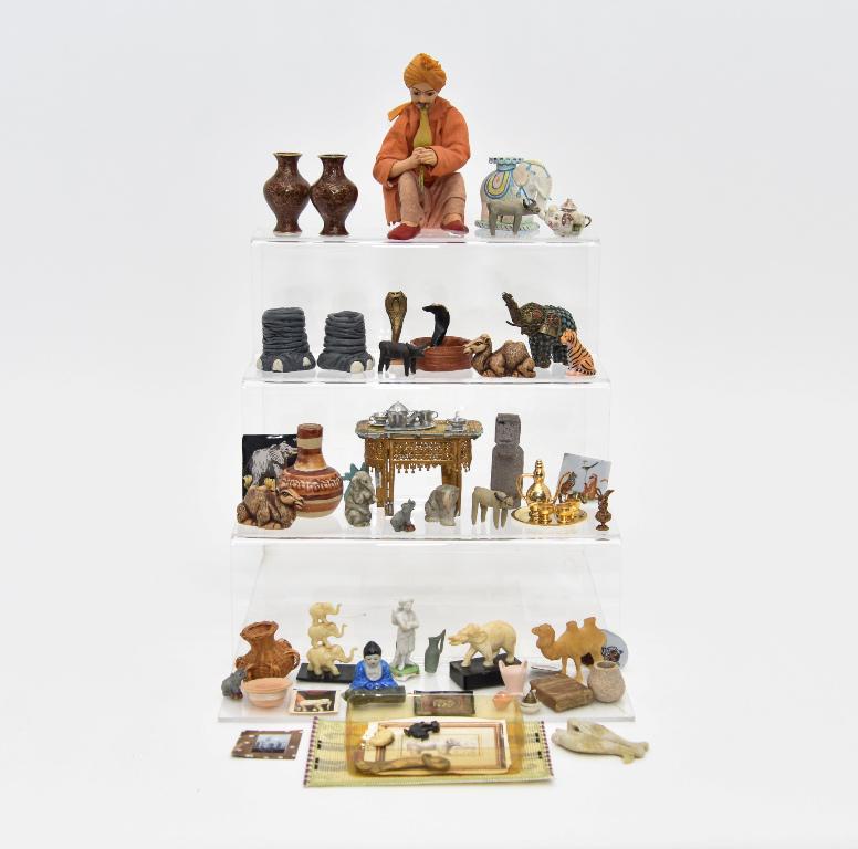 India Style Dollhouse Miniature Accessories: Earthenware snake charmer figure 4.5"H with chipped cobra in basket, vintage soft metal table with bends set with pewter tea ware, pottery vases, elephant form table signed Pasha Jones 1 7/8"H, earthe