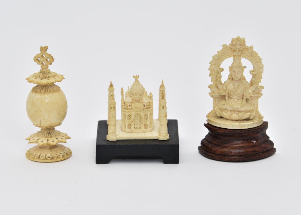 Carved Bone Taj Mahal, Buddha and Snuff Box: Intricately carved bone Taj Mahal set on a wood base 2.5" square, carved bone Buddha on a rosewood base 3.5"H, antique egg shaped snuff box with age cracks and small chip on finial 3.5"H
