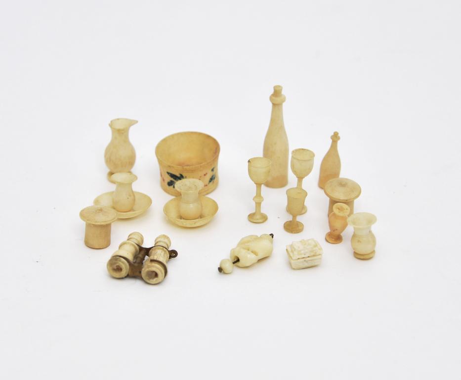 Vintage Small Bone Accessories: Antique English bone Stanhope binoculars 1"L, decanter with stopper, bottle, wineglasses, vases, two pitchers lacking handles, covered dish, canisters, two vases on bowls, elephant pendant
