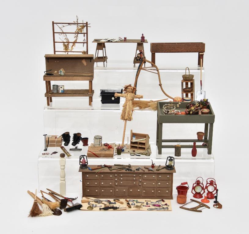 Dollhouse Workbenches & Tools: Dollhouse wood workbench with cans on paint 4.25"W, painted gardening workbench 4.5"W, raised wood flower bed 5"L, dollhouse kit being assembled on sawhorses 5"L, plastic table saw, shelves made from 
