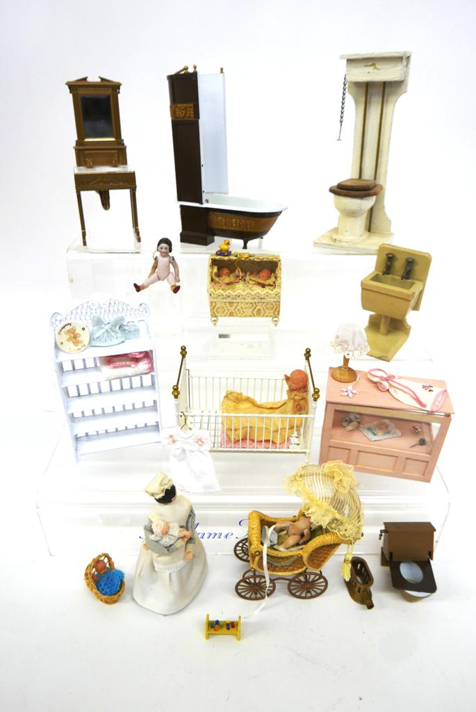 Dollhouse Nursery & Bathroom Furniture & Fixtures: Wood store counter filled with baby rattles, china, shoes, milk bottle, cap, gown and toy 4"W, two plastic babies in a vintage lace covered bassinet with bead feet 2.75"W, painted wire and brass crib