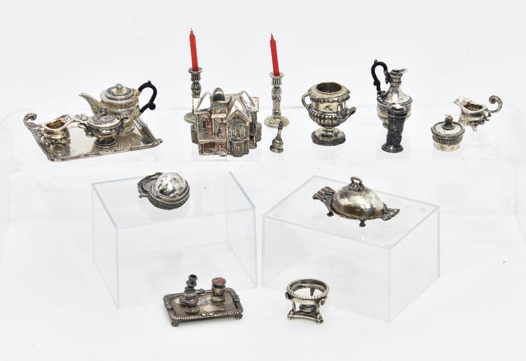 English Sterling Dollhouse Miniatures: Nice collection of dollhouse sized miniature table accessories with English sterling silver hallmarks, wine cooler 7/8"H, Victorian mansion with open back 1 1/8"W, pair of candlesticks, oval cover on