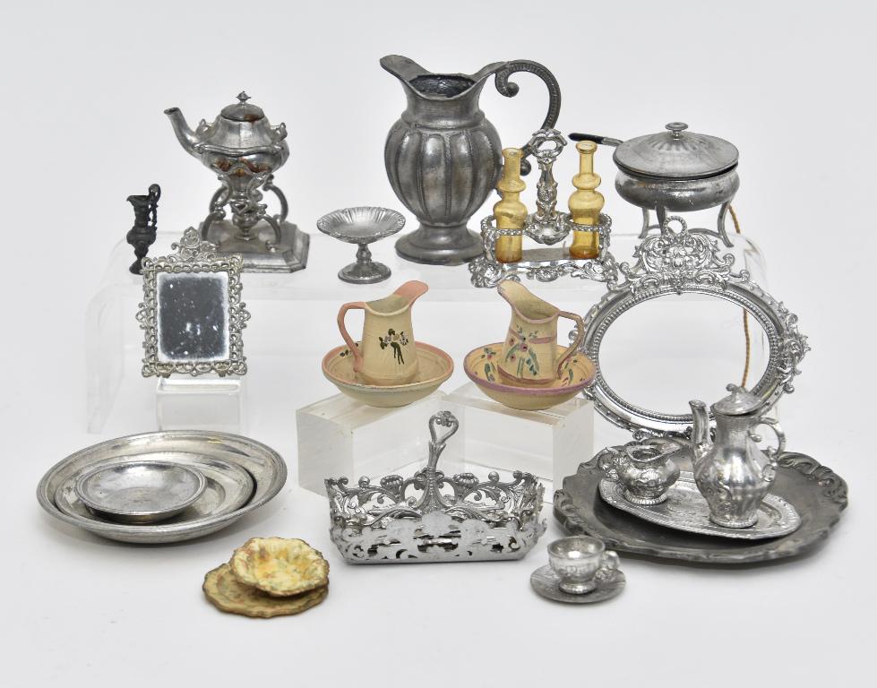 Vintage Dollhouse Table Accessories: Assortment of mostly German vintage dollhouse table accessories, teapot on warming stand 2.5"H, cutlery tray with contents 2.5"L, pitcher, 2.5"H, three trays or basins, teapot 1.75"H with creamer, cup