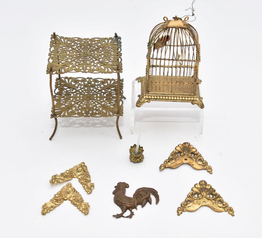 Ormolu Birdcage & Table Dollhouse Miniatures: Vintage dollhouse ormolu birdcage with a melted wax bird 2.5"W, 3.25"H, vintage ormolu square table with lower shelf 2.75" square by 3"H, ormolu rooster, four corner from a frame, small candlestick