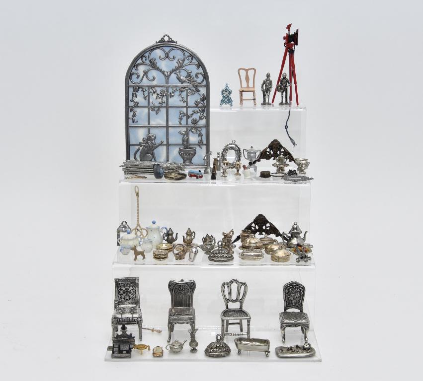 Assorted Dollhouse Pewter Accessories: Twenty Seven piece of WAPW English pewter table wares including tureens, plates, baskets, urn, jugs etc., Danforth oval teapot 1.5"H, four New View chairs in different styles, Seagull Teddy Bear batht