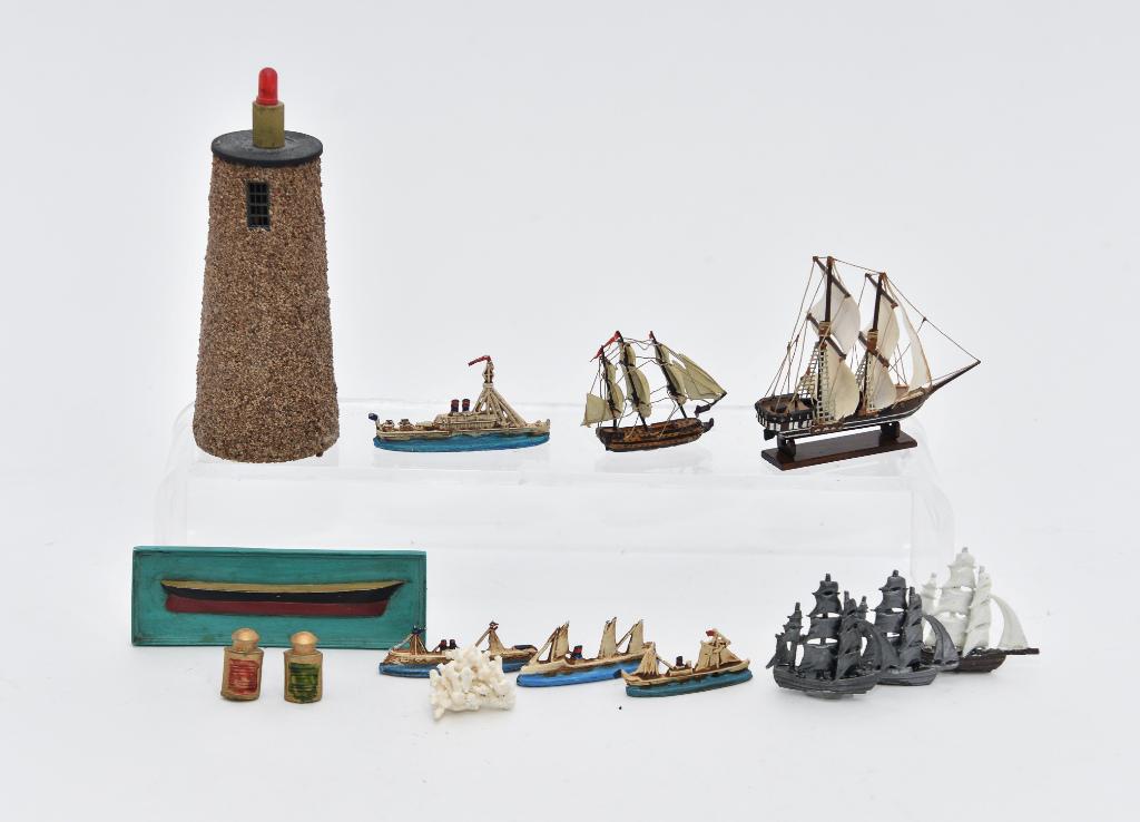 Dollhouse Miniature Ships & Models: Artisan two mast schooner under full sail mounted on a mahogany base signed John 77, 2.75"L, Charles Fox half hull model mounted on plaque 3"L, eight cast metal ships, piece of coral, battery operated