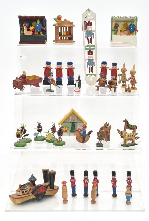 Small Dollhouse Wood Toy Miniatures: Nice assortment of small wood toys including some vintage German, pair of West German fair booths 2"W and hanging toy shelf, antique truck with a damaged wheel, steamboat, birdcage with eggs, vintage 