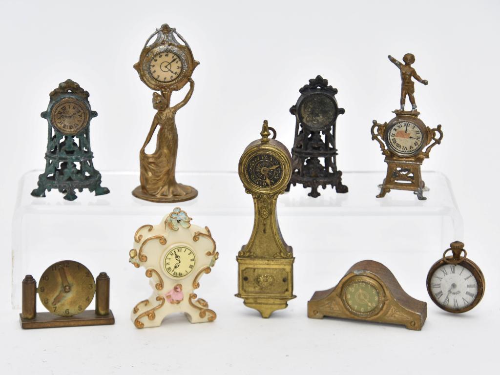 Vintage Dollhouse Clock Miniatures: Soft metal Art Nouveau figural clock 3.25"H, French style soft metal figural clock, two rococo style soft metal clocks, machined brass Art Deco style clock 1 5/8"W, French ormolu toy pocket watch 1.5"