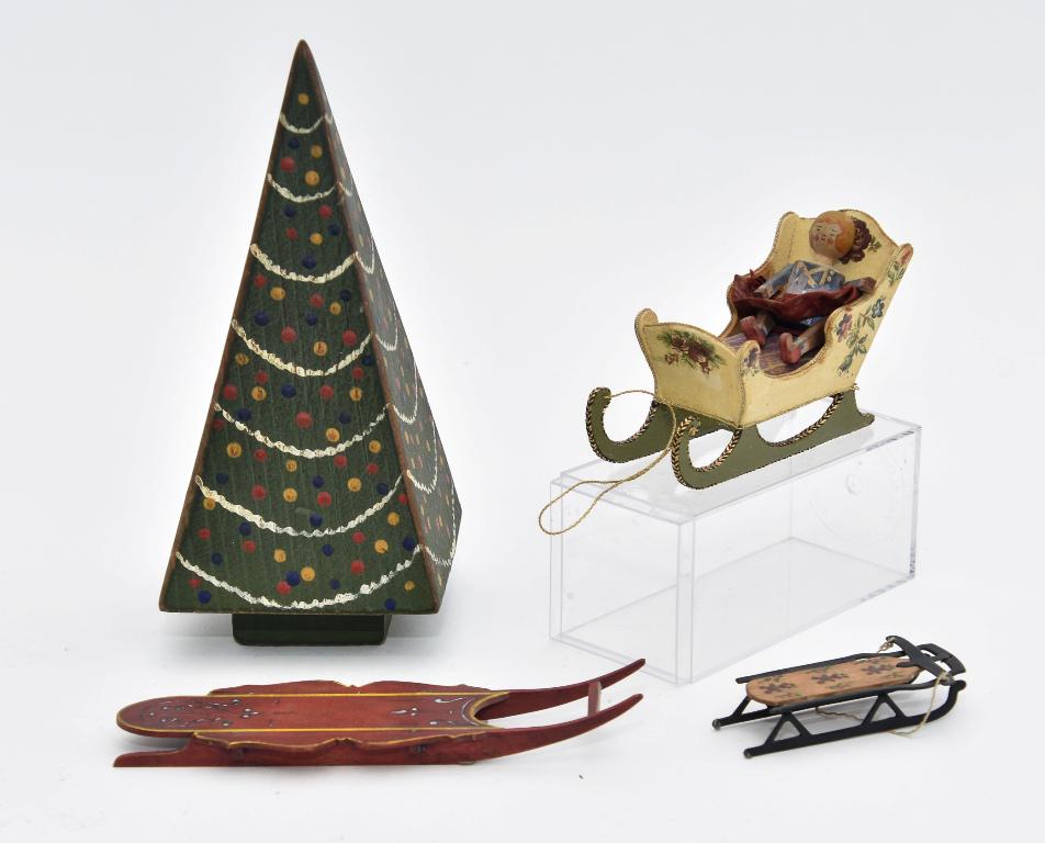Mell Prescott Sleigh & Other Dollhouse Miniatures: Mell Prescott wood sleigh holding a jointed wood peg doll, 4.5"L, hand painted tin and wood sleigh signed Small Thoughts with illegible signature 3"L, hand painted wood sled signed ASB 6.25"L, hand pa