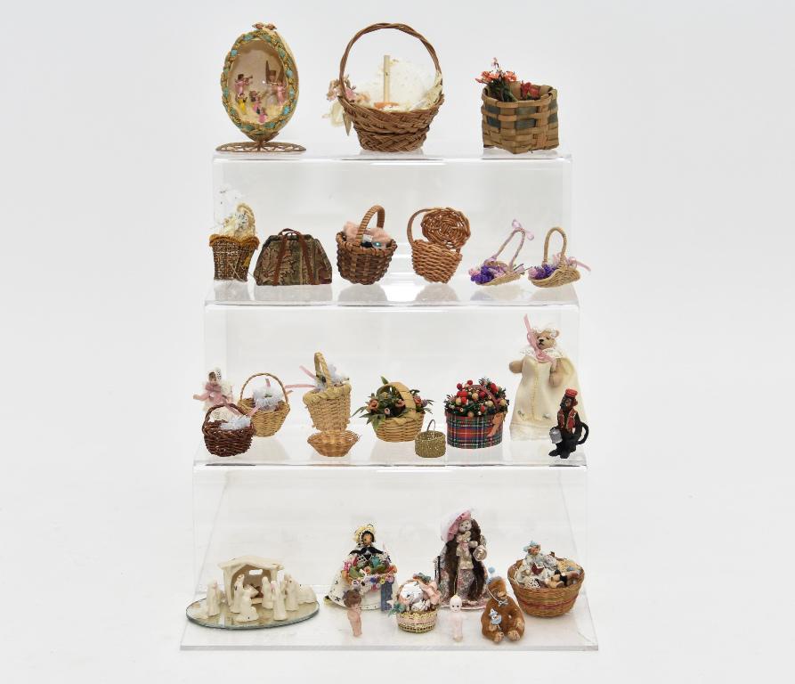 Small Dollhouse Dolls & Baskets: Artisan clay peg style little doll holding a basket of treats 2"H, bisque jointed doll dressed in lace 1.5"H, small bisque nativity scene on oval mirror 3"W, tiny angels inside of a damaged egg on an 