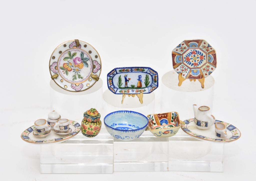 Amanda Skinner Dollhouse China & Others: Amanda Skinner Canton style punch bowl 1.25"D and Japanese Imari style platter, deep bowl and covered jar, hand painted Limoges plate on brass stand 1/38"D, unsigned Quimper style tray 1.5"W, pair of 