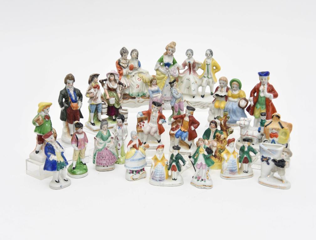 Small Vintage Bisque Figurines: Nice selection of small vintage bisque figures, Capodimonte boy and girl carrying buckets 3.25"H, pair of French style figures on white bases with blue stripes 2.75"H, eleven figures stamped Occupied 
