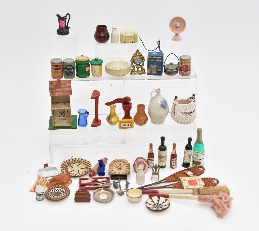Assorted Dollhouse Small Accessories: Assorted small accessories include a vintage wag on the wall clock with cardboard face, advertising food containers, Acoma Indian pottery figural container 1.5"H, Indian style basket 1.5"D, wood vases