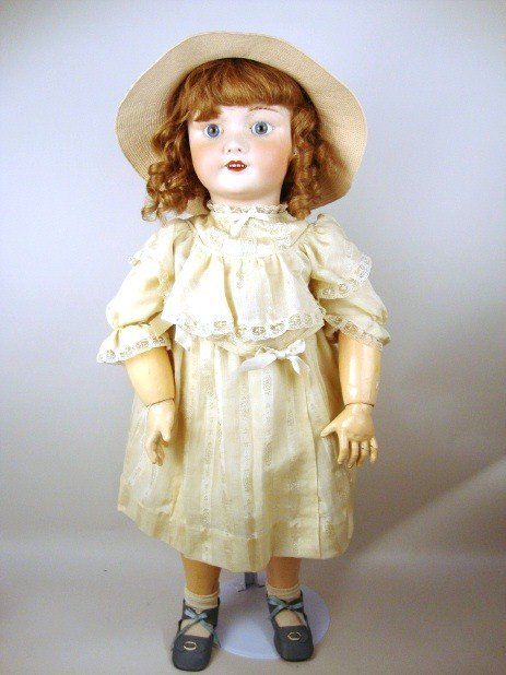 SFBJ Bisque Doll: 1926 France SFBJ 301 30 1/2" Paris 16 Bisque Head on jointed Composition Body w/Bebe Jumeau Diplome d Honneur label, Blue eyes have been Set, replaced Wig, nicely Dressed