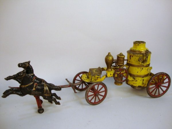 Cast Iron & Tin Horse Drawn Fire Pumper Wagon: Cast Iron & Tin Horse Drawn Fire Pumper Wagon, Cast Iron Horses & Tin Wagon pumper, could be either Wilkens or Pratt & Letchworth, missing firemen, appears to have broken tanker valve handle, Some Pie