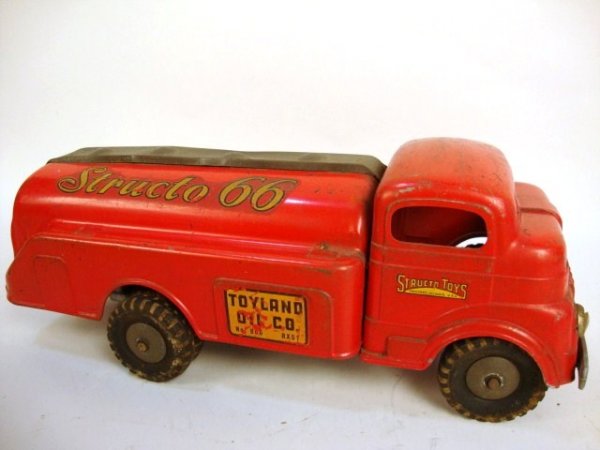 Structo 66 Gasoline Tank Truck: Structo 66 Wind-up Gasoline Tank Truck, has decals on both sides of top tank, Toyland Oil Co, decals on sides, played with condition