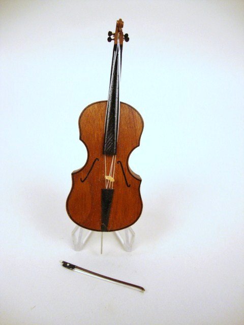 Artisan Harold Cello: Cello signed Harold, 1987, 4" t
