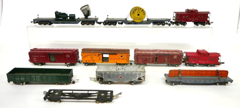 American Flyer S Gauge Freight Car Lot of 10: American Flyer S gauge freight car lot of 10 - 2 - 7210 depressed center flat car one with 636 cable reelt, one with generator & searchlight, 629 M.P livestock car (missing coupler and one set of whee