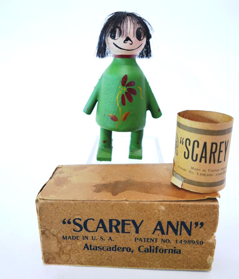 Scary Ann" Wooden Doll: Scary Ann Doll with original paper and box, circa 1920's, metal on back causes hair to rise! 6"