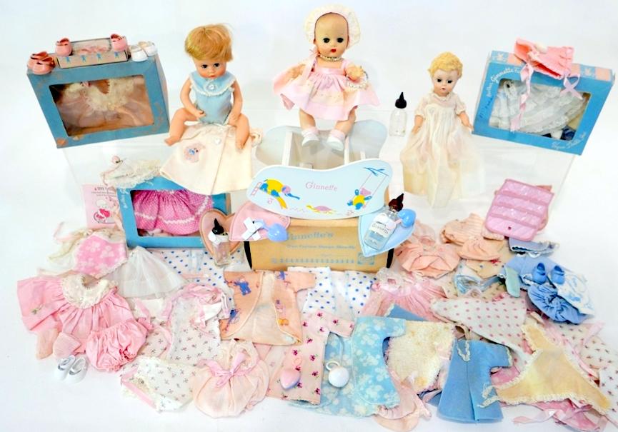 Ginett's Dolls, Accessories, and Clothing some in: Three Ginette Dolls, Three Boxes of Clothing #7762, #7727, # 2332, Rocker in ob, Accessories, clothing, shoes, etc. This is a great lot!