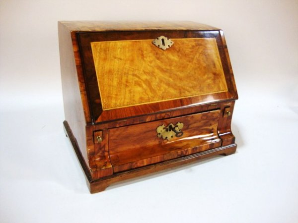 18th C. Dutch Desk Exotic Woods: Highly polished Queen Anne slant-top desk made from a variety of exotic veneers and featuring prominent brass escutcheons, slides, the interior fitted with three pigeonholes and five drawers with inla