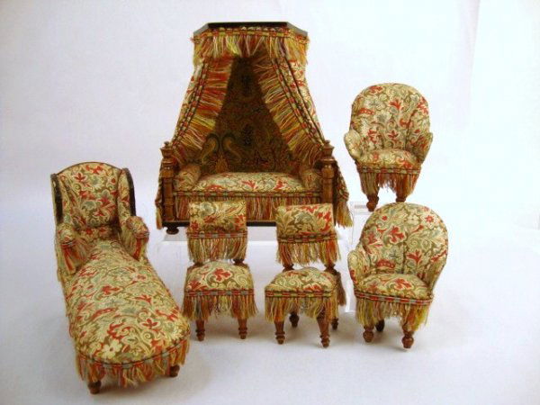 Rare German Upholstered Parlor Suite: Very desirable German 6-pc set of parlor furniture upholstered in a colorful cotton print in superb condition with fringe intact and including a canopied bed , chaise, two armchairs and two side chair