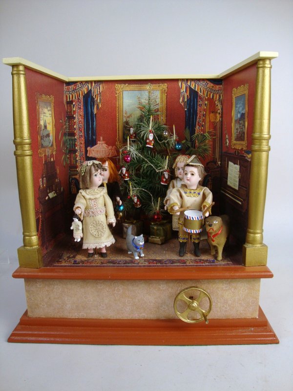 Kummerow Christmas Animated Diorama: Outstanding Victorian Christmas morning roombox by Lew Kummerow featuring four animated children who move when the front handle is cranked, a delightful feather tree decorated with small Santas, color