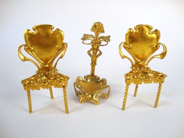 Nouveau Ormolu Chairs and Umbrella Stand: An ornate pair of ormolu shield-back chairs with Art Nouveau styling with matching umbrella stand with minor discoloration on the base 3" H.
