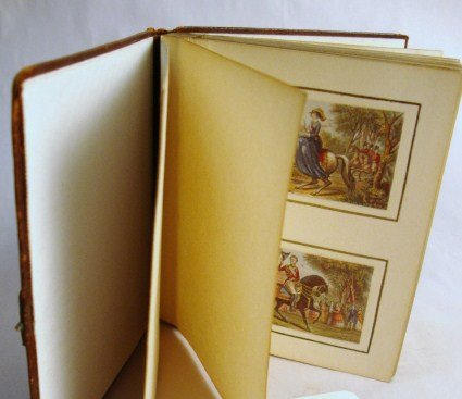 Miniature Baxter Prints in Leather Case: Minature Baxter prints in a leather case, opens to display an album of mounted prints, with 20 prints, 1.5 x 2", of castles, hunt scenes, flowers, etc. Case 3.75" L.