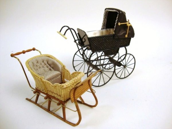 Roberson Perambulator and Hardy Sleigh: An English pram by Colin and Yvonne Roberson 5" L and a delightful wicker sleigh by Carol Hardy.