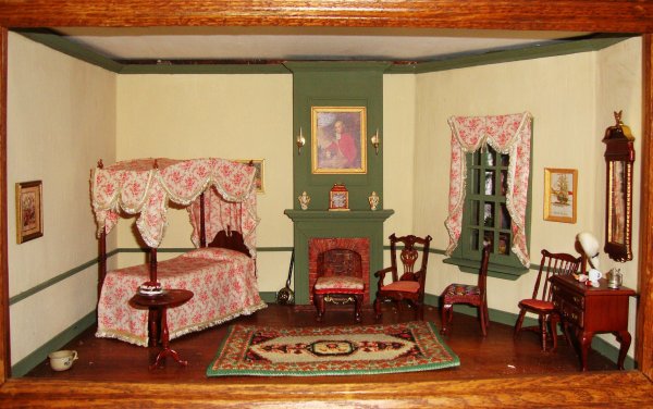 Williamsburg Bedroom: Spacious colonial bedroom with sage green trim, elegantly dressed full tester bed, commercial dressing table and mirror, petitpoint rug. 20" L, 11" H.