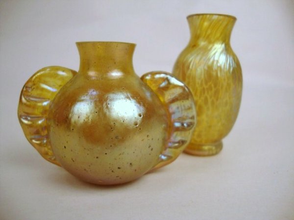 Two Miniature Gold Iridescent Loetz Vases: Two miniature gold iridescent Loetz vases, one w/bulbous handle 1.7" H, gold oil spot vase 2" H.