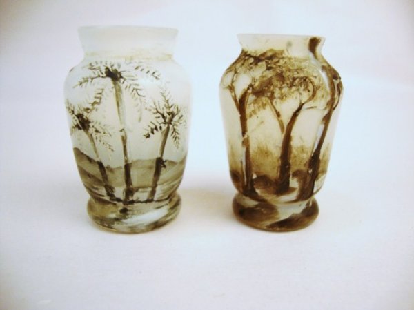 Two Miniature Enamel Vases: Two miniature enamel vases, one with palm trees, one with winter scene, white background, 1.5" H.