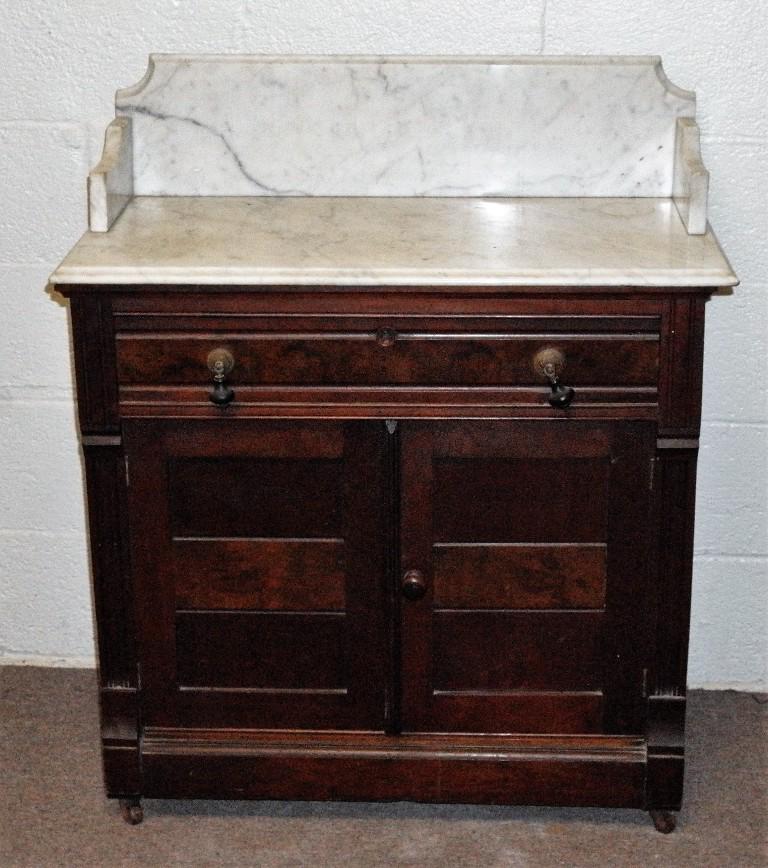 Antique Marble Top Wash Stand: Antique Victorian wash stand, paneled sides and doors, sections of burl veneer, marble top with surround, original knobs and hardware, 31.5"W, 18.5"D, 37"H, buyer is responsible for arranging shipping