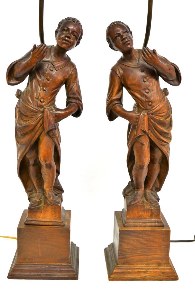 Pair Antique Blackamoor Carved Statues Turned Into: Pair of antique carved mahogany Blackamoor statues standing on steps, intricate three dimension carvings made have been originally church or post decorations, early 20th century conversion to lamps, o