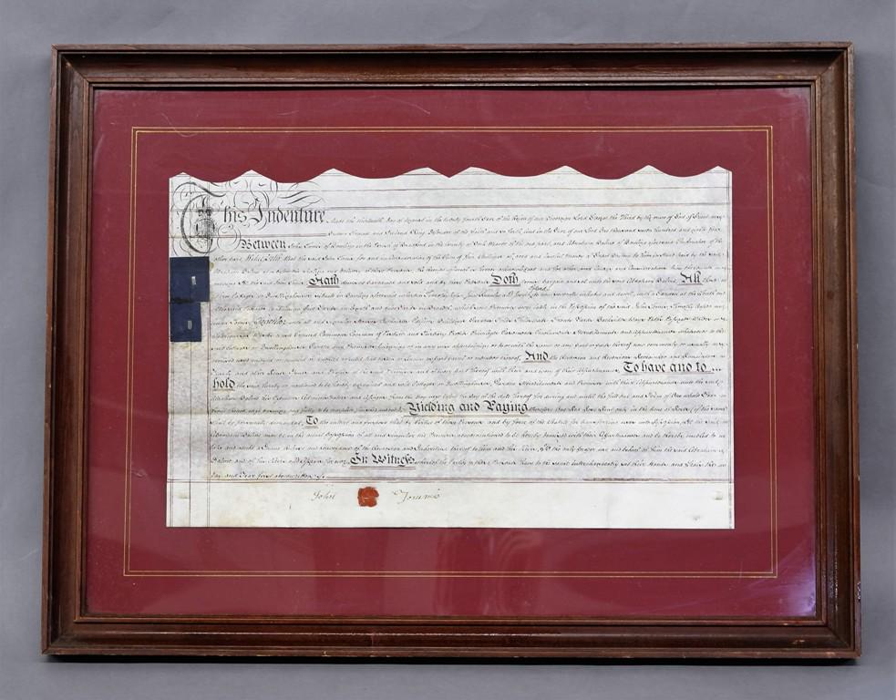 1784 George III Framed Indenture: Original hand written indenture of velum dated 1784 with intact seals, 14" by 22", housed in a wood frame 24" by 31"