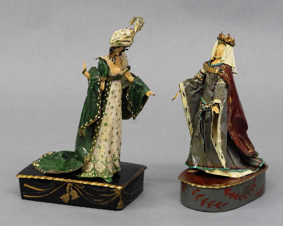two Lee Menichetti Artisan Sculptures: Lee Menichetti [New York & Palm Beach Florida 1931 - 1997] well known theatre related artist, hand bent and hand painted bent sheet brass sculptures depicting three tradition costumes from Switzerland