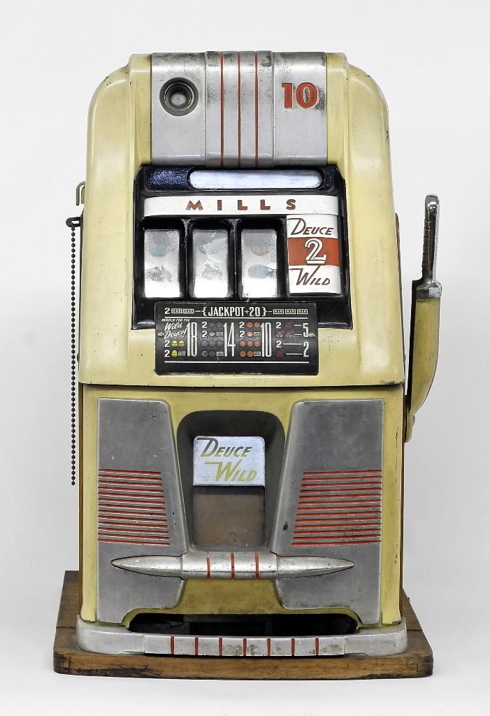 Vintage Mills Deuce 2 Wild Slot Machine: Vintage Mills Deuce 2 Wild 10 cent slot machine circa 1940's, serial number paper tag 589764, paper factory inspection tag dated 12-49, good used unrestored condition, 26"H, 16"W, 15.25"D