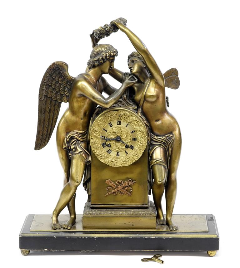 Antique French Silk Suspension mantel Clock: Antique French 19th century figural mantel clock, brass or bronze with an applied patina on a wood base, includes pendulum and key, brass eight day time and strike movement signed AC, 16"W, 19"H, 6"D