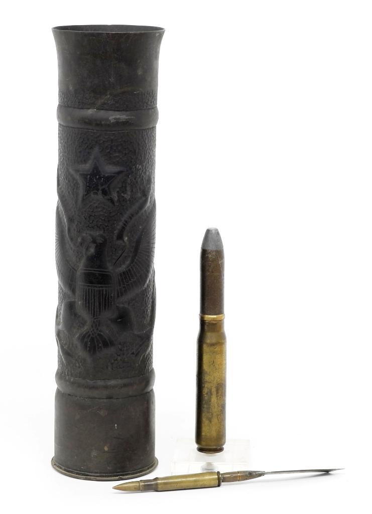 U.S. Military Trench Art: U.S. Military trench art brass shelf decorated with a spread wing eagle that is raised and engraved within a stippled panel surrounded by banding, raised panel on rear spells out "MOTHER" in vertical