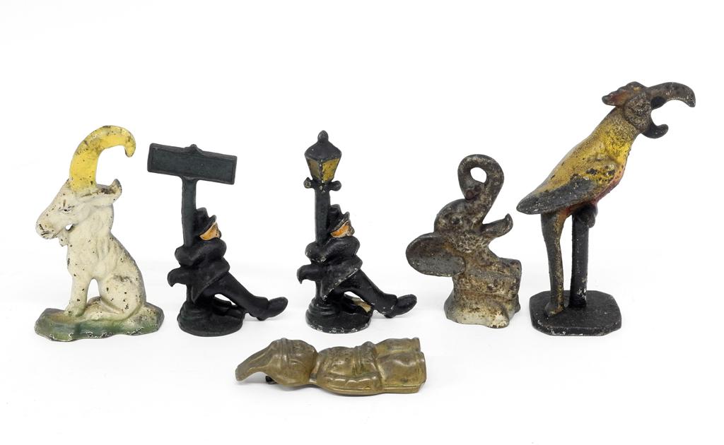 Antique Figural Iron Bottle Openers: Group of three painted cast iron figural bottle openers, parrot 5"H, elephant and goat, pair of vintage cast iron drunk openers, Iroquois Indian Head Beer & Ale brass and steel figural Indian bottle o