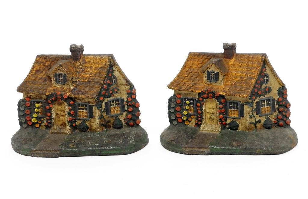 Antique Hubley Figural Cottage Door Stoppers: Pair of antique Hubley cast iron cottage door stoppers with original paint 7.5"W